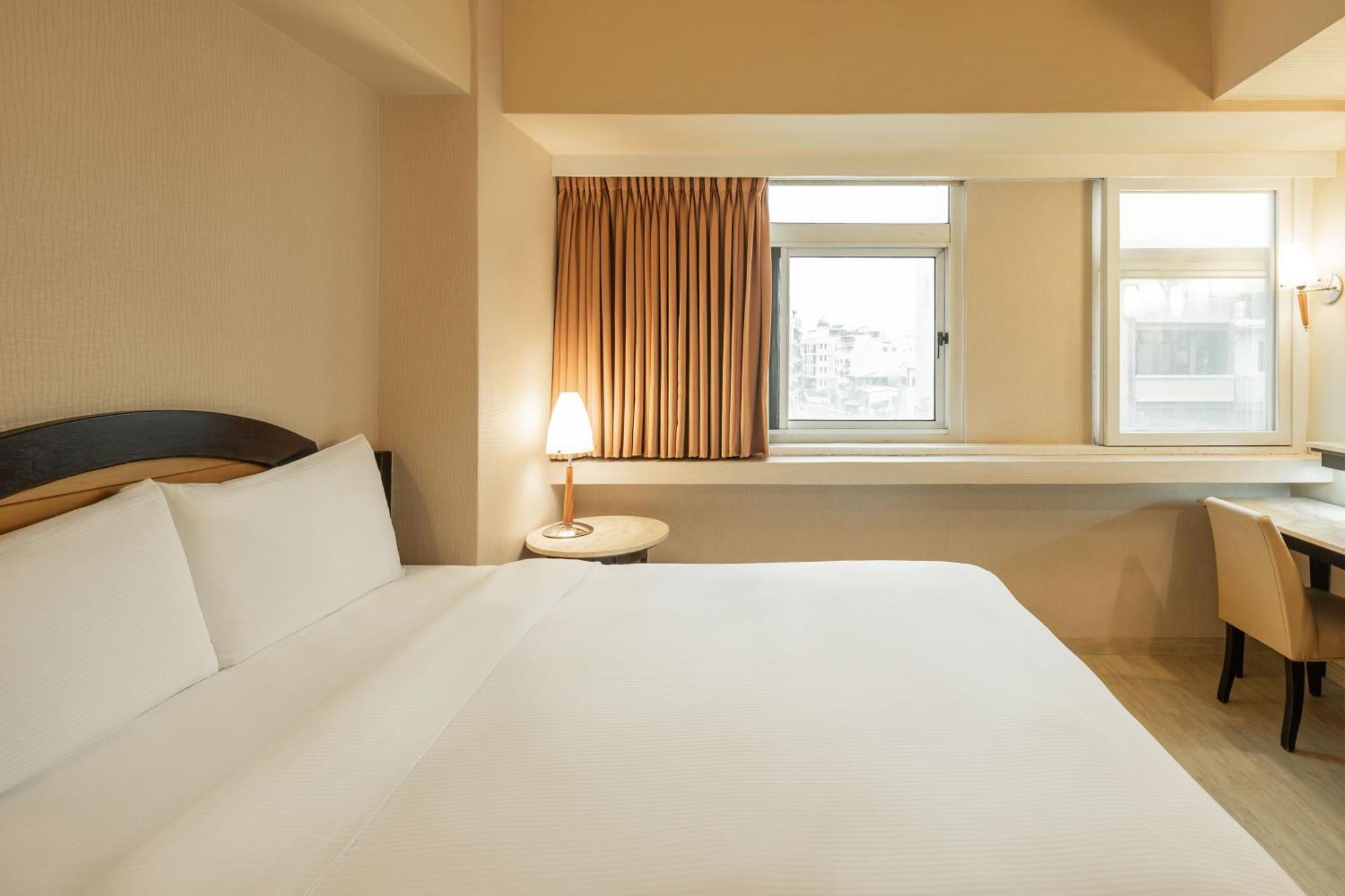 Kindness Hotel Weiwuying Kaohsiung Habitación foto
